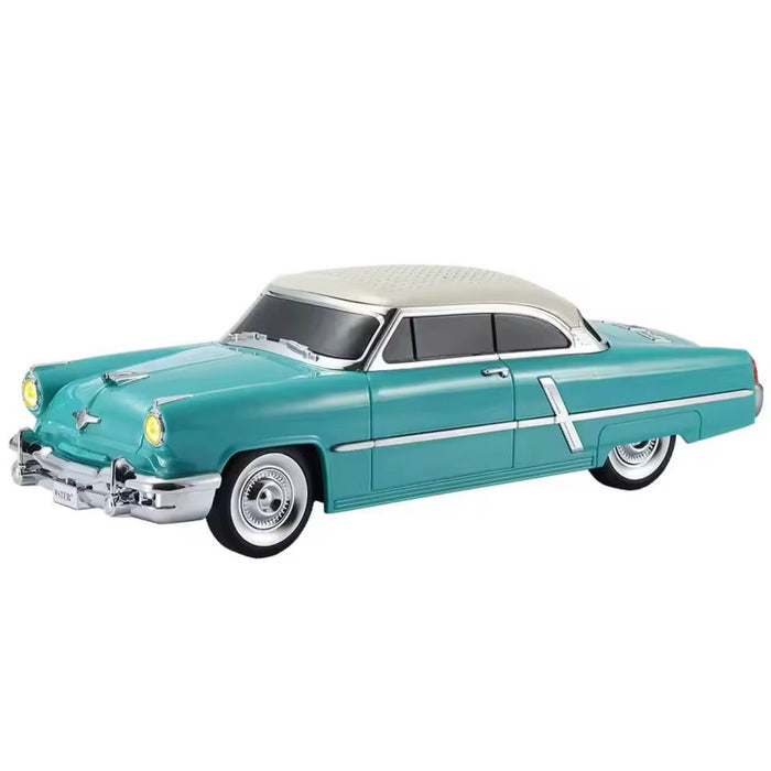 Model of a classic turquoise car with white top on a white background