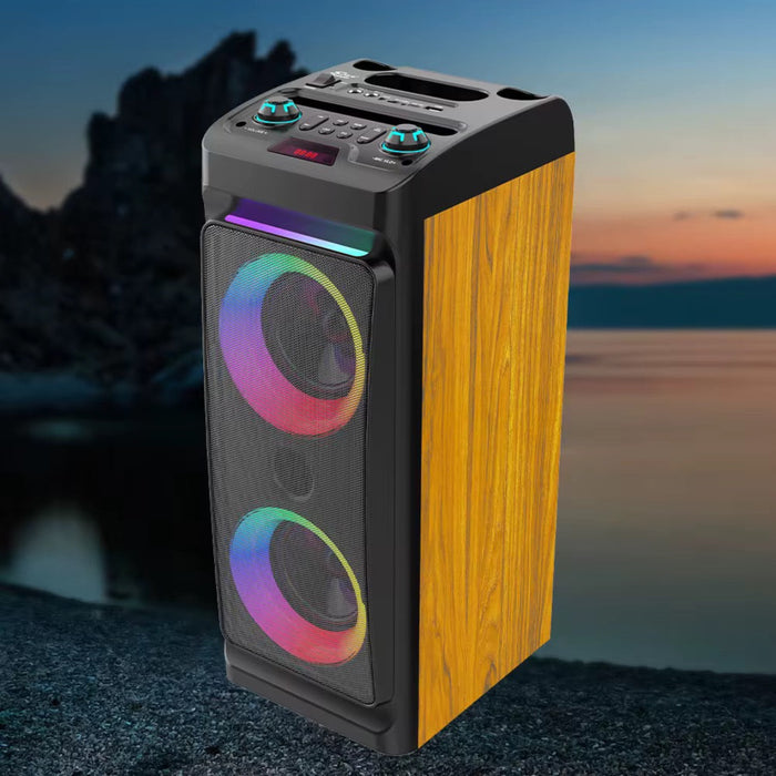 Portable speaker with RGB lighting on a wooden panel against a sunset lakeside background