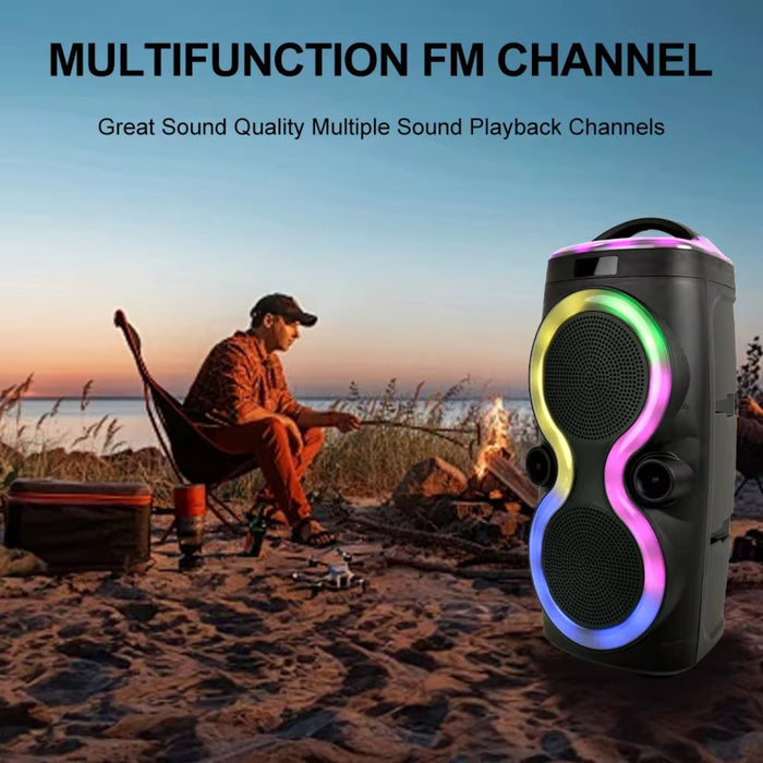 Portable speaker with colorful lights on a beach at sunset, with text about multifunction FM channel.