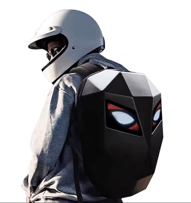 Person wearing a futuristic backpack with glowing eyes on a white background
