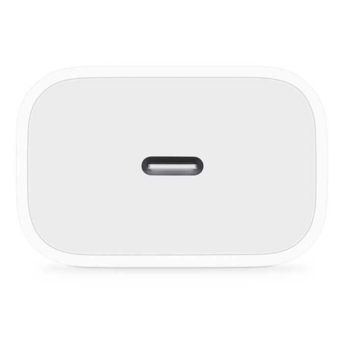 White rectangular device with a black button on a white background