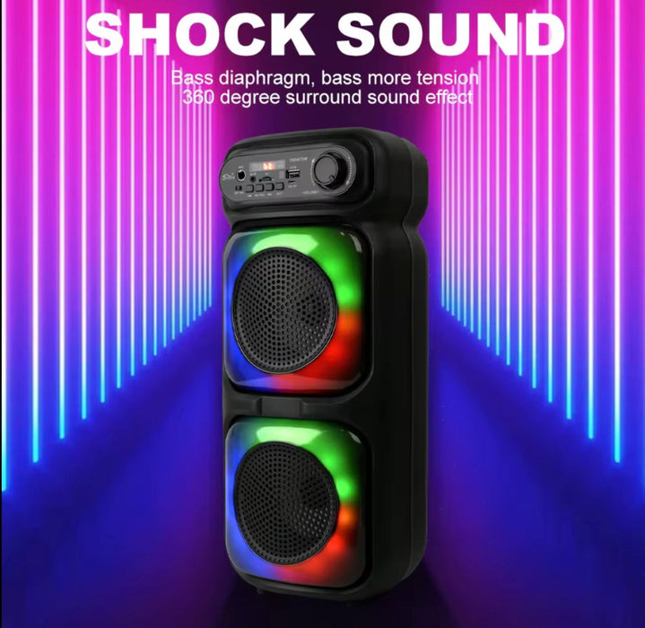Black speaker with colorful LED lights on a purple and blue gradient background, featuring text about sound effects.