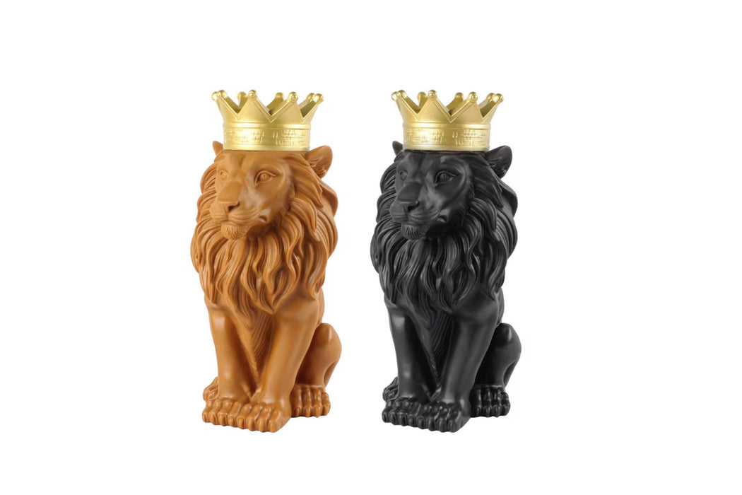 Two lion figurines, one brown and one black, each wearing a gold crown on a white background.