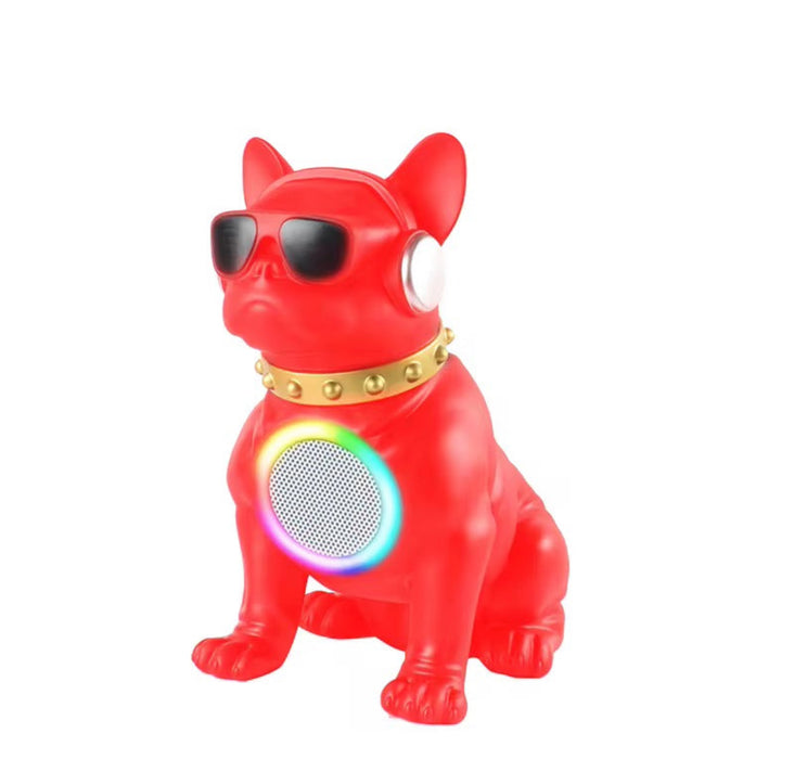 Red dog-shaped toy with sunglasses and a colorful speaker on a white background