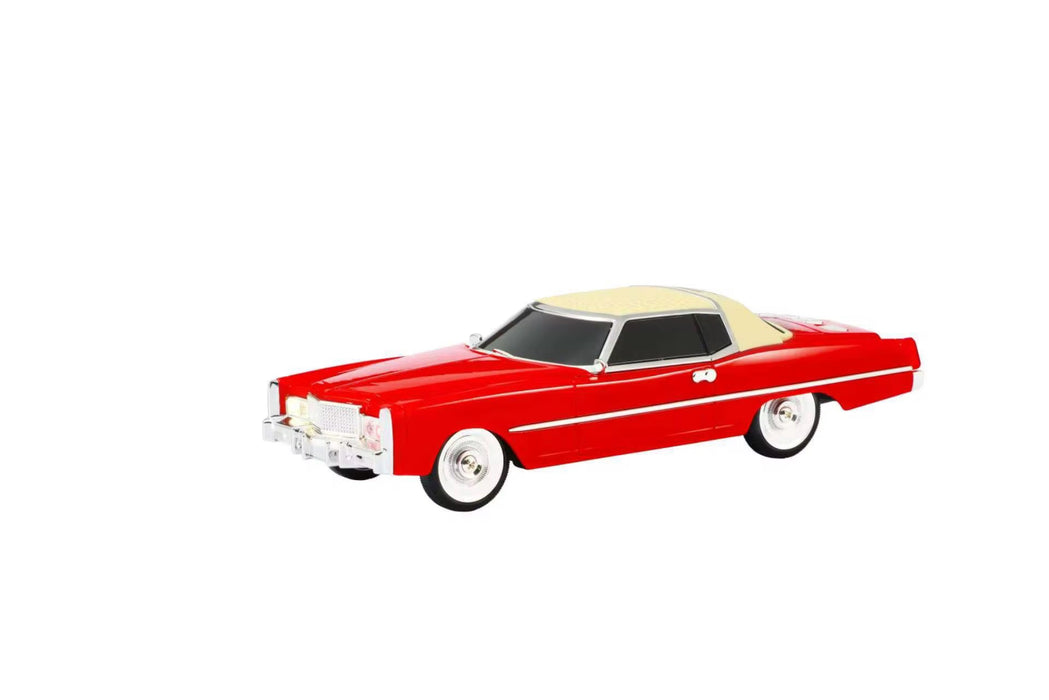 Red vintage car model on a white background