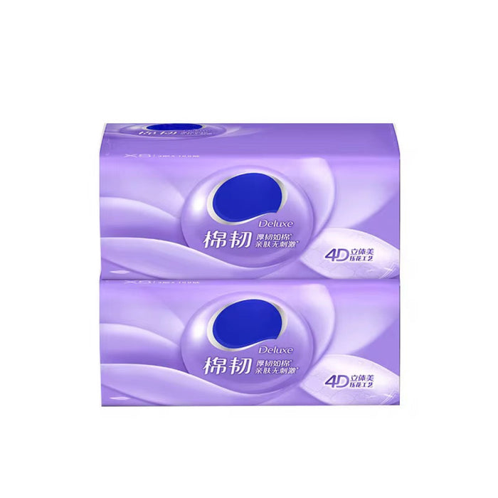 Purple tissue box with 'Deluxe' branding on a white background