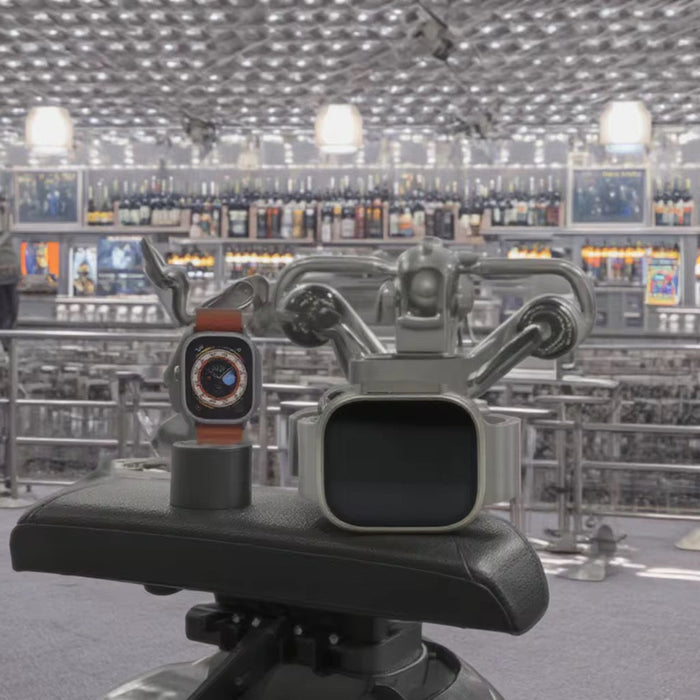 Robotic arm with a device on a counter in a store setting