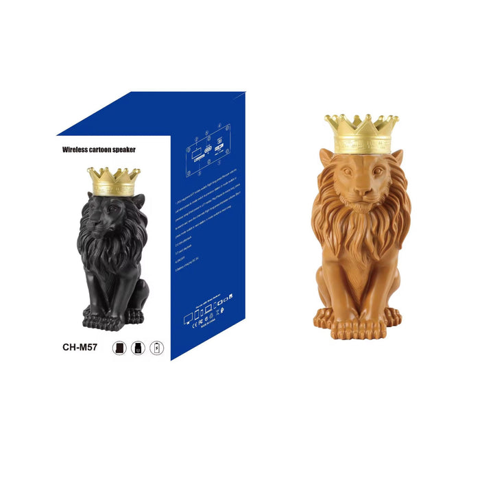 Two lion figurines with crowns, one black and one brown, next to a blue speaker packaging.