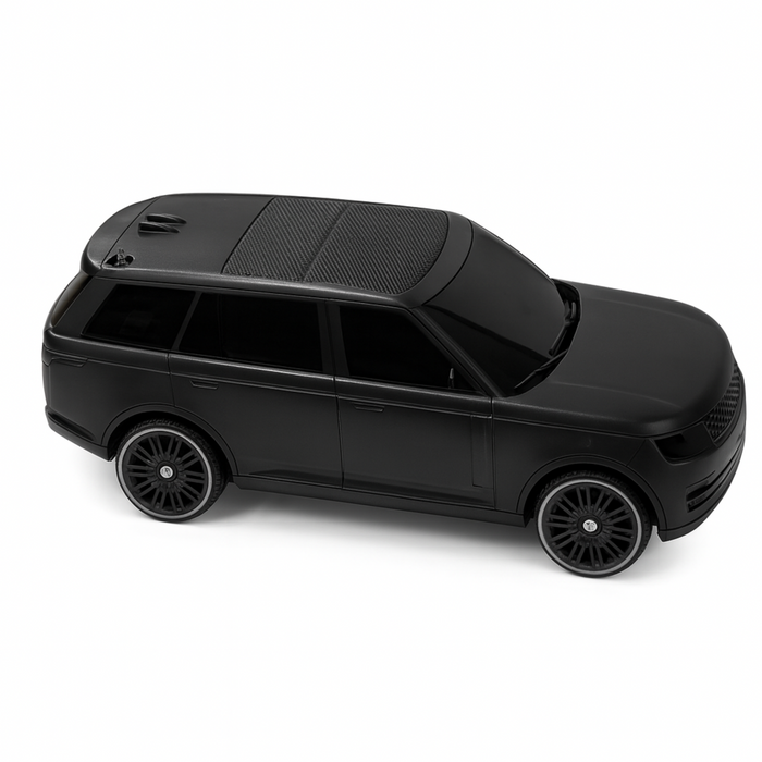 Black toy car on a white background