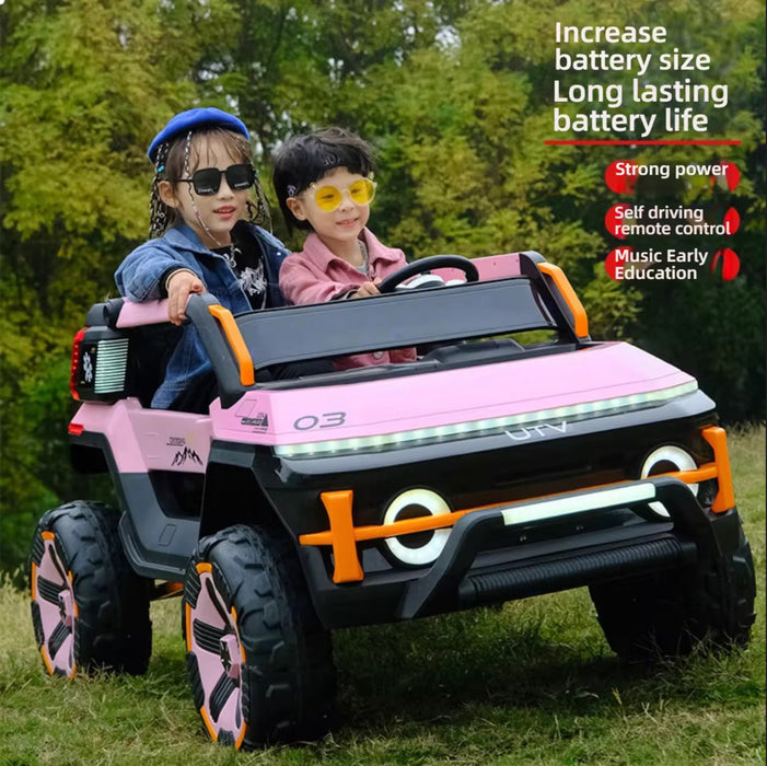 Two children in a pink and black toy car with outdoor background