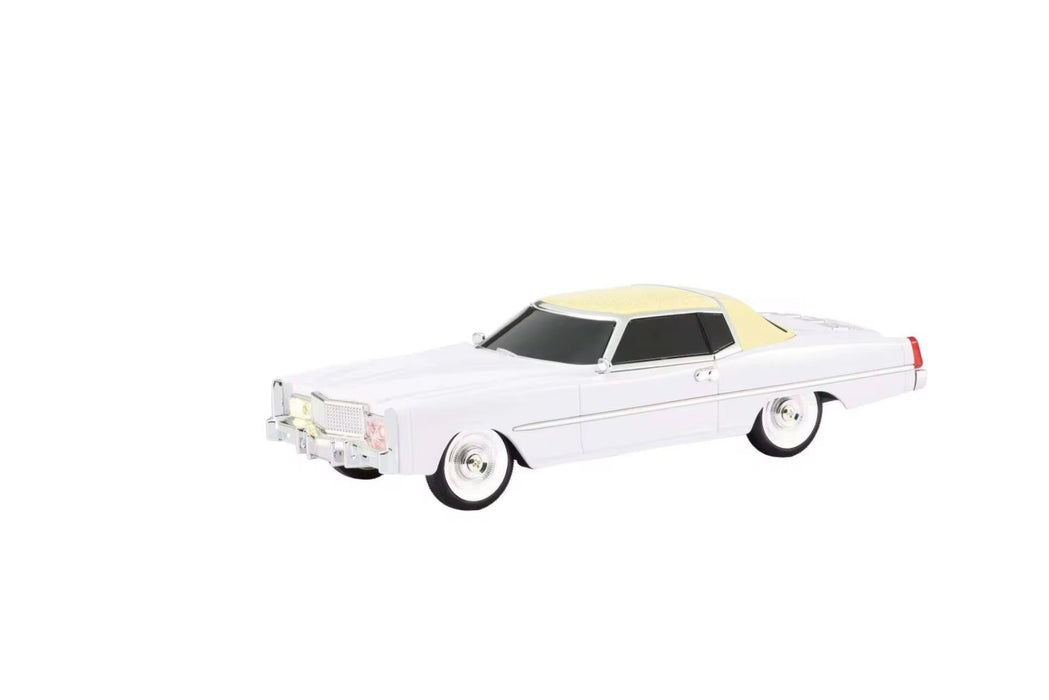 Model of a classic white car with a yellow interior on a white background