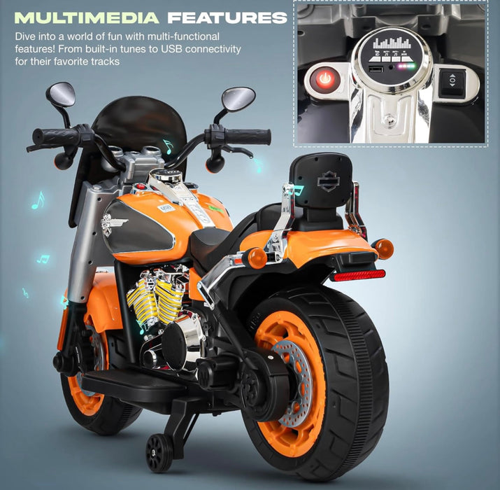 Orange and black toy motorcycle with multimedia features on a gray background