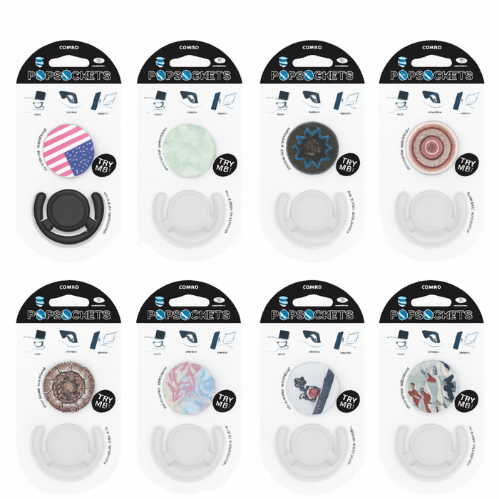 Multiple packages of PopSockets with various designs on a white background