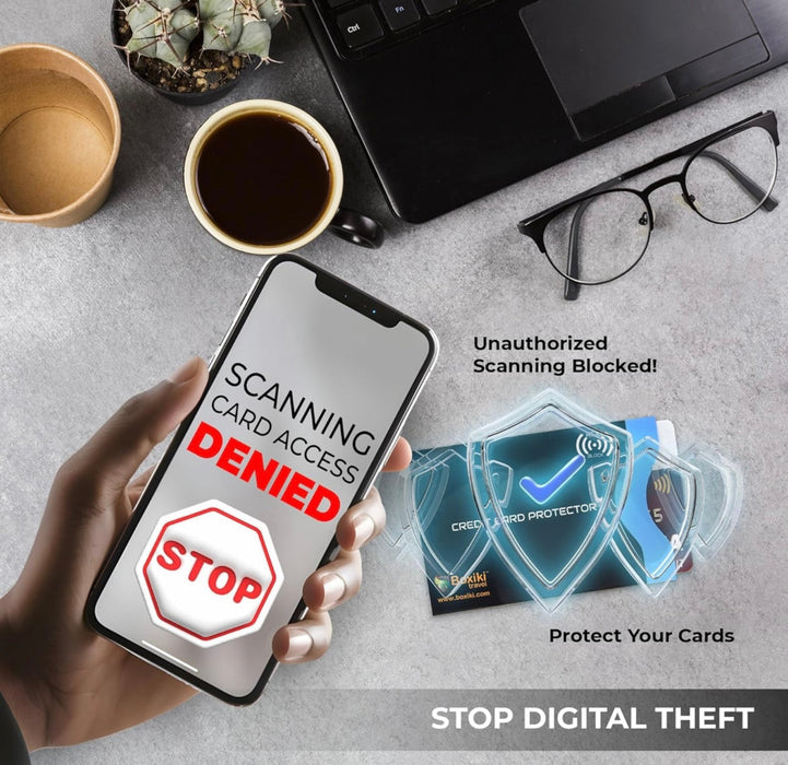 Phone screen showing 'Scanning card access denied' with a card protector and coffee cup on a desk.