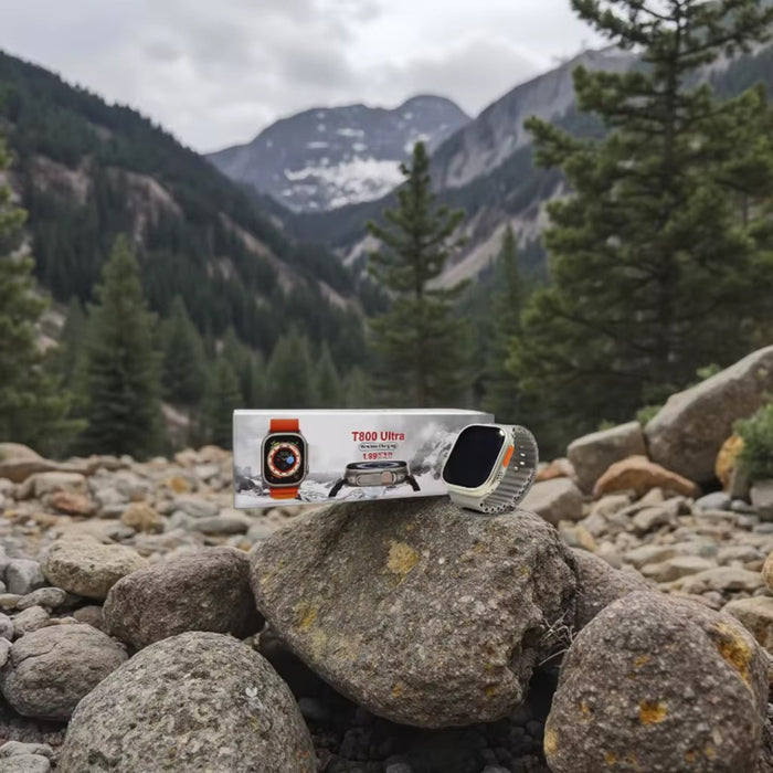 Camera lens on a rock with a mountainous landscape in the background