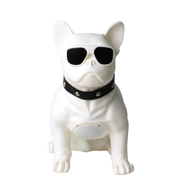White dog-shaped speaker with sunglasses and a black collar on a white background