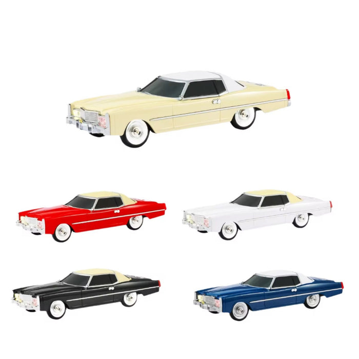 Five model cars in different colors on a white background