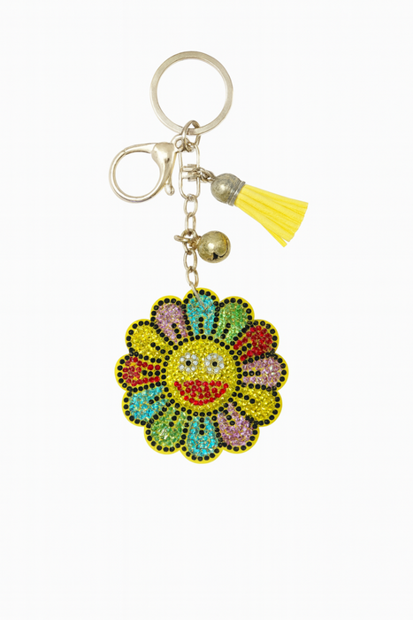 Colorful keychain with a sunflower design on a white background