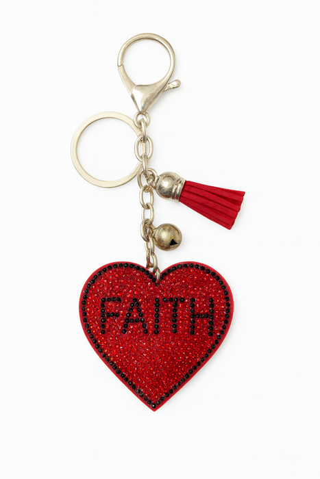 Red heart-shaped keychain with 'FAITH' text on a white background
