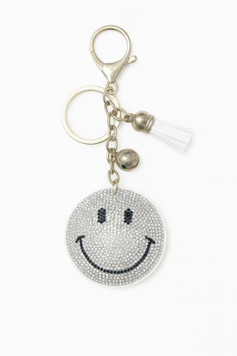 Keychain with smiley face design on a white background