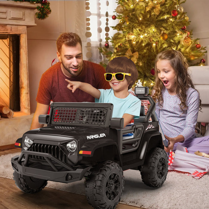 Family playing with a toy jeep in a festive living room.
