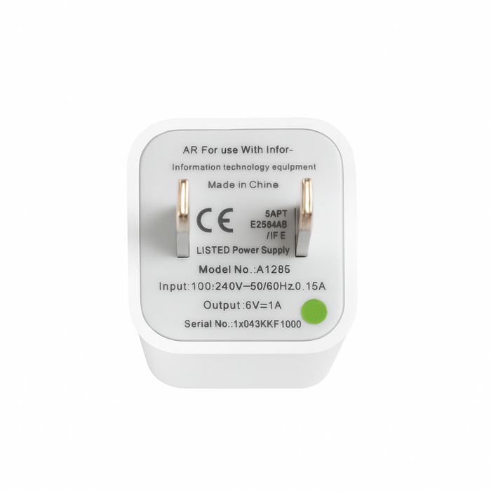White power adapter with certification labels on a white background