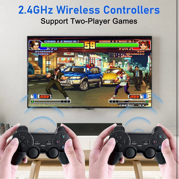 Two hands holding wireless controllers in front of a screen displaying a video game, with text about 2.4GHz wireless controllers and two-player support.