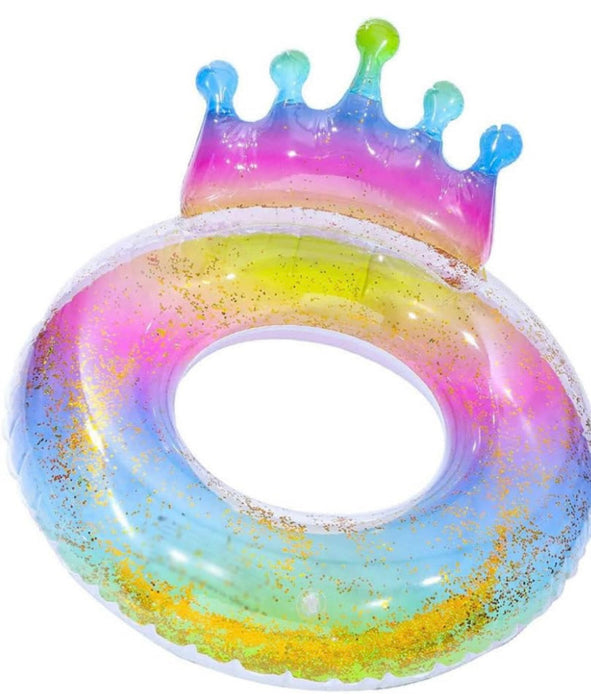 Colorful inflatable ring with a crown on a white background