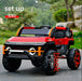 Red and black toy truck with orange accents on a road