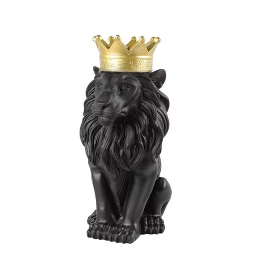 Black lion statue with a gold crown on a white background