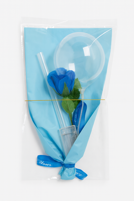 Blue flower-shaped straw with a clear plastic bulb in a blue package on a white background