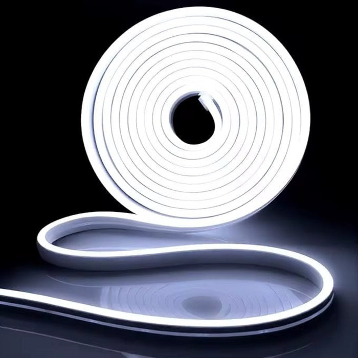 Roll of white LED strip light on a black background