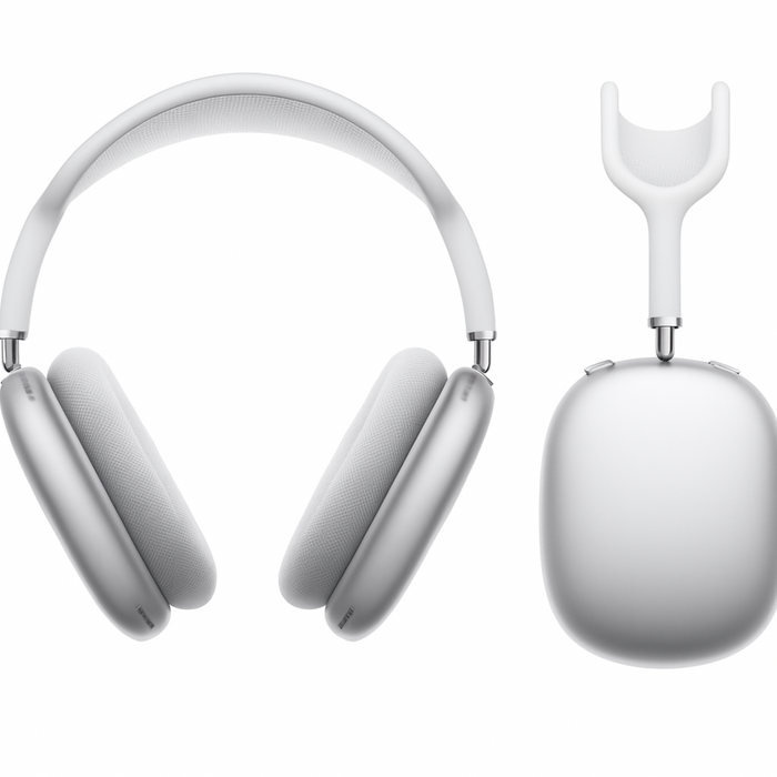 White over-ear headphones with a charging case on a white background