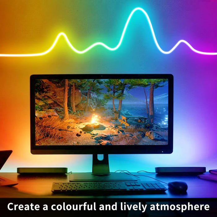 Computer monitor with nature-themed wallpaper, colorful LED strip lights, and text 'Create a colourful and lively atmosphere'.