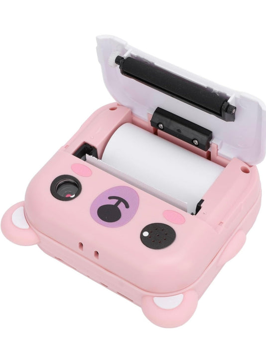 Pink cartoon-style printer with a white roll of paper on a white background
