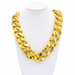Gold chain necklace on a white mannequin bust
