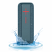Blue portable speaker with water splash effect on a white background